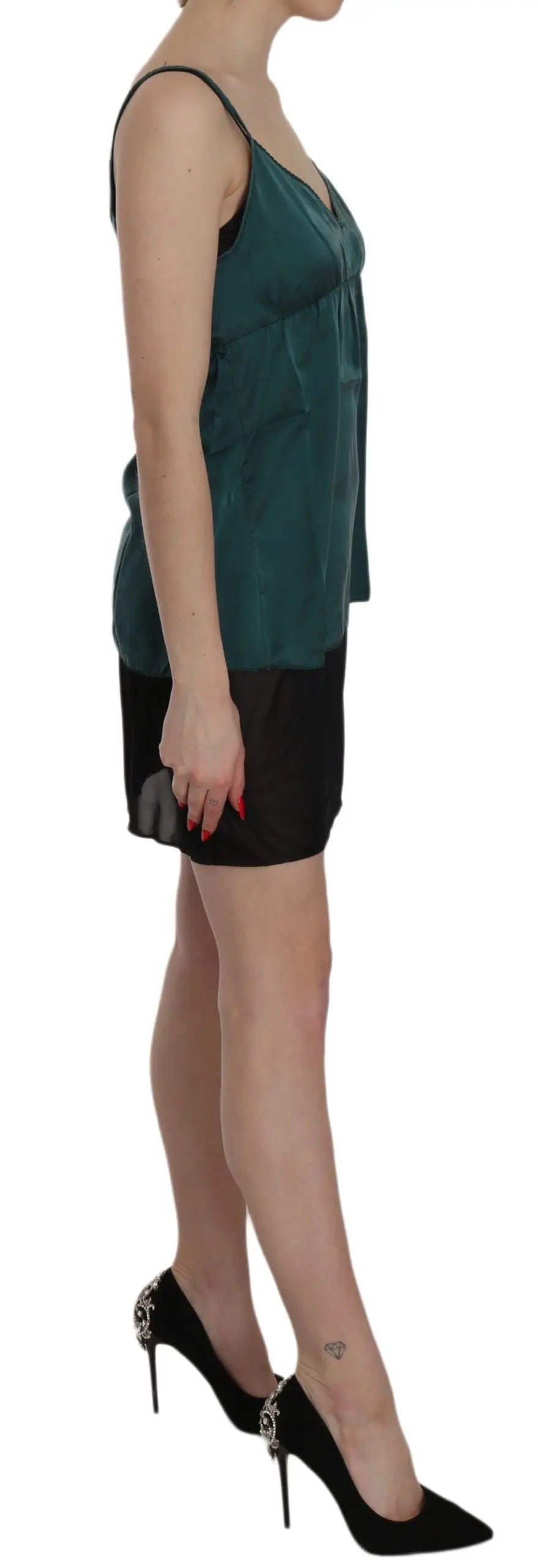 Green silk spaghetti strap shift mini dress with V-neck and sheer black hem.