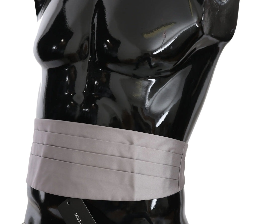 Gray silk pleated men's cummerbund waist belt on black mannequin torso.