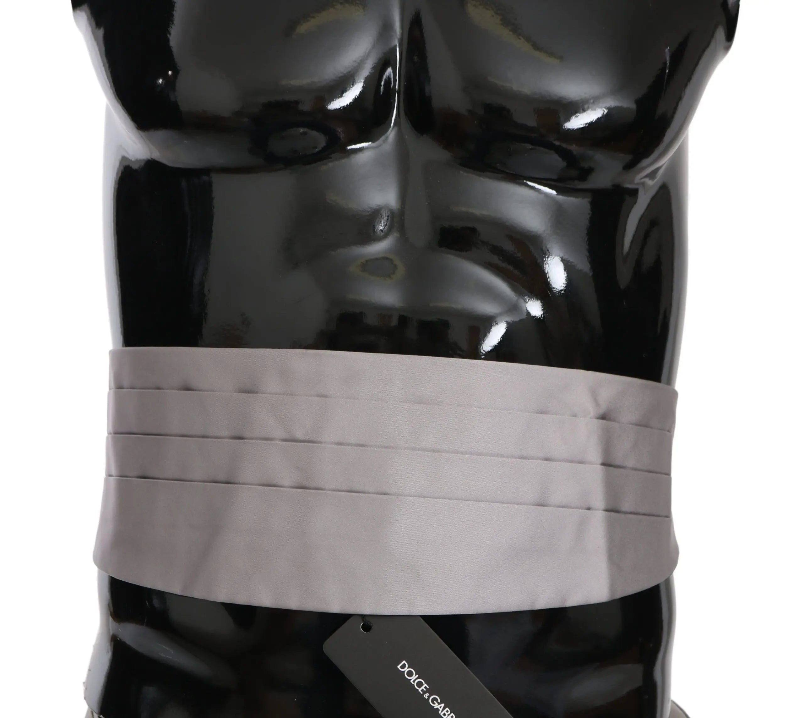 Gray silk pleated men's cummerbund waist belt on black mannequin torso.