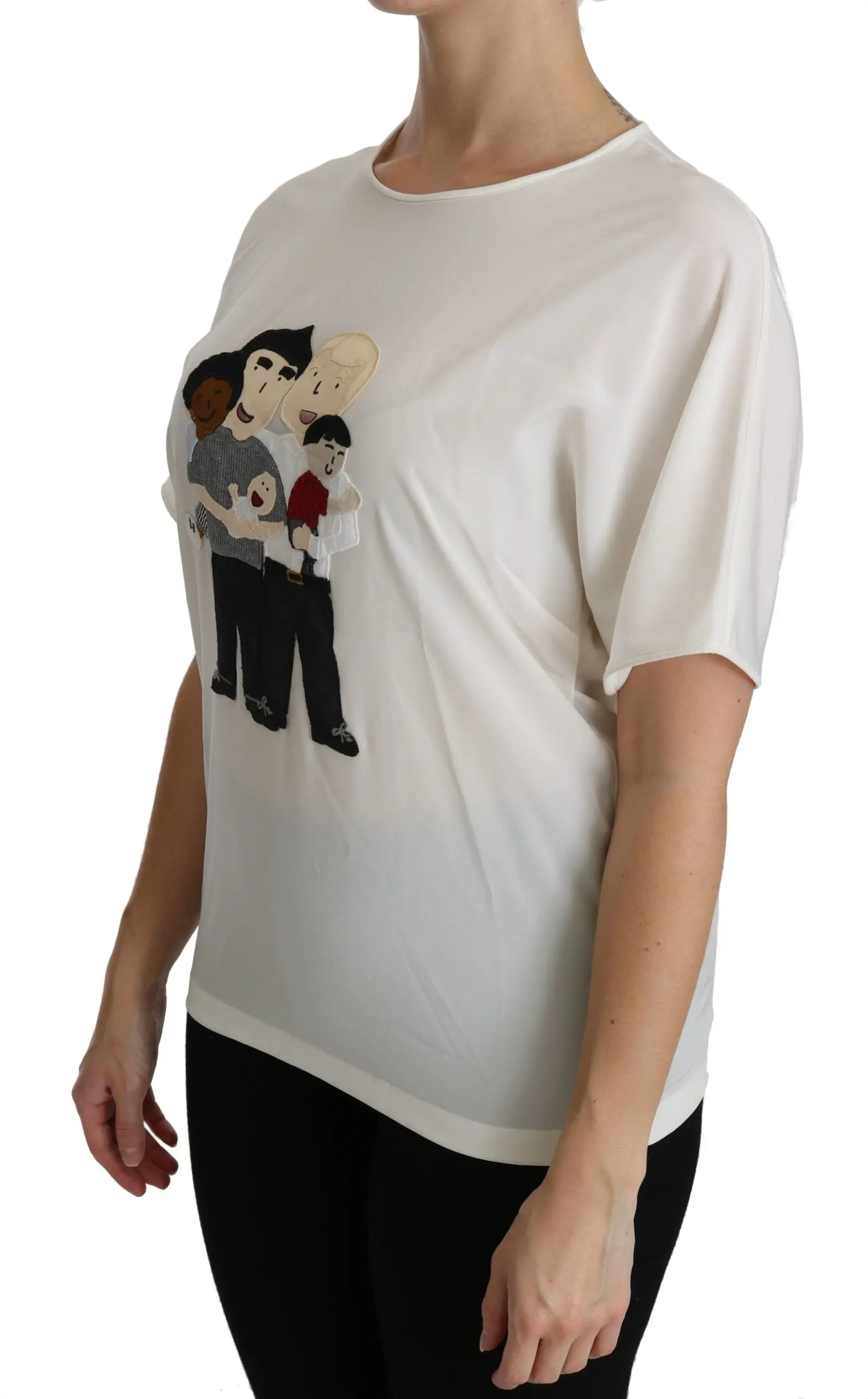 White silk short sleeve blouse with cartoon family patch on front.