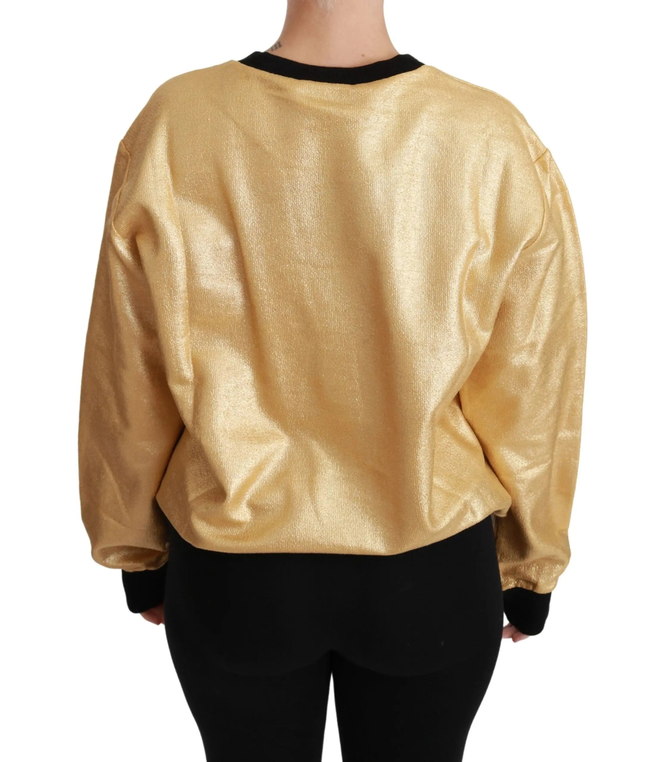 Gold cotton crewneck pullover sweater with black cuffs and neckline, relaxed fit.