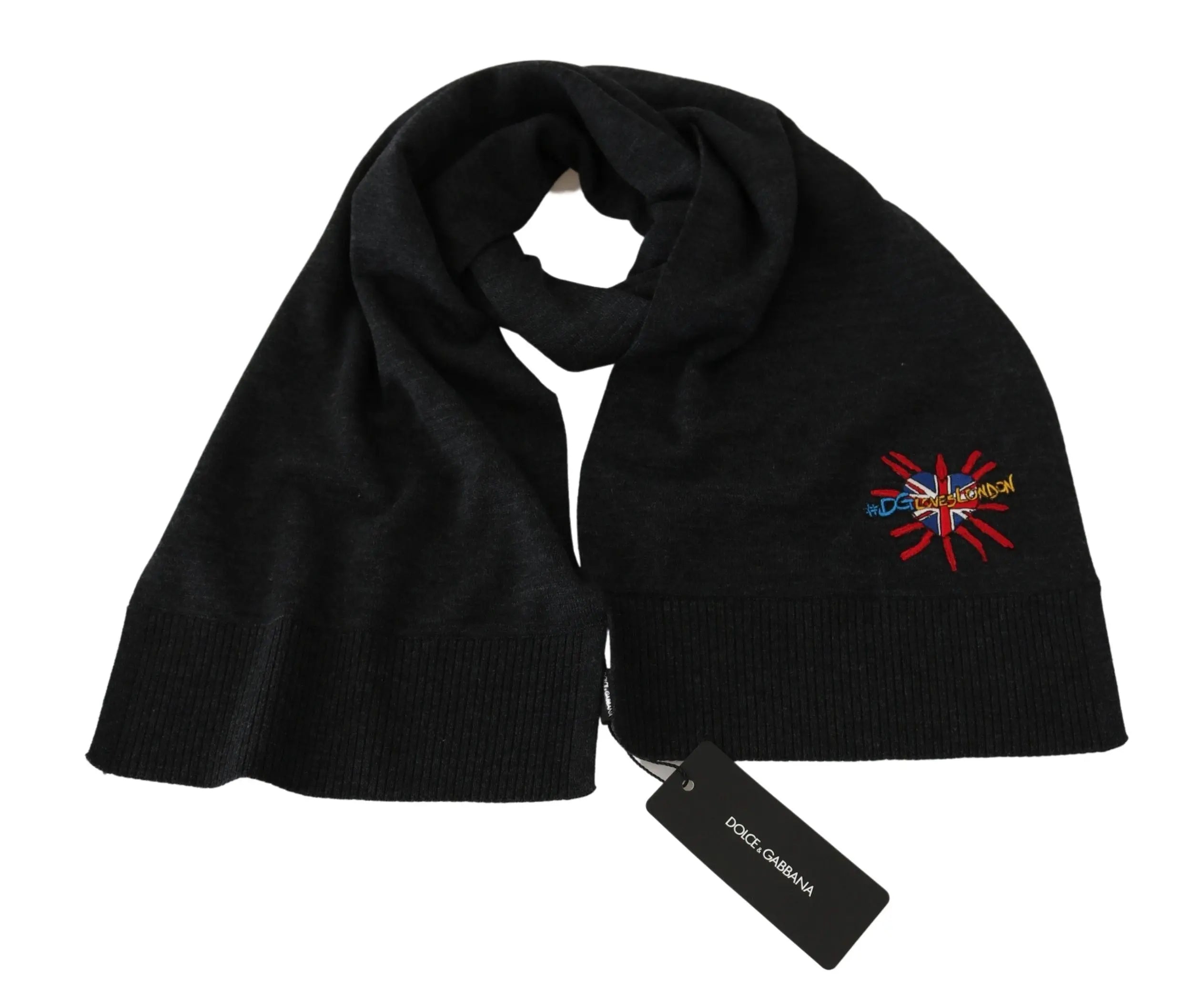 Gray wool scarf with embroidered multicolor starburst detail on black mannequin bust.