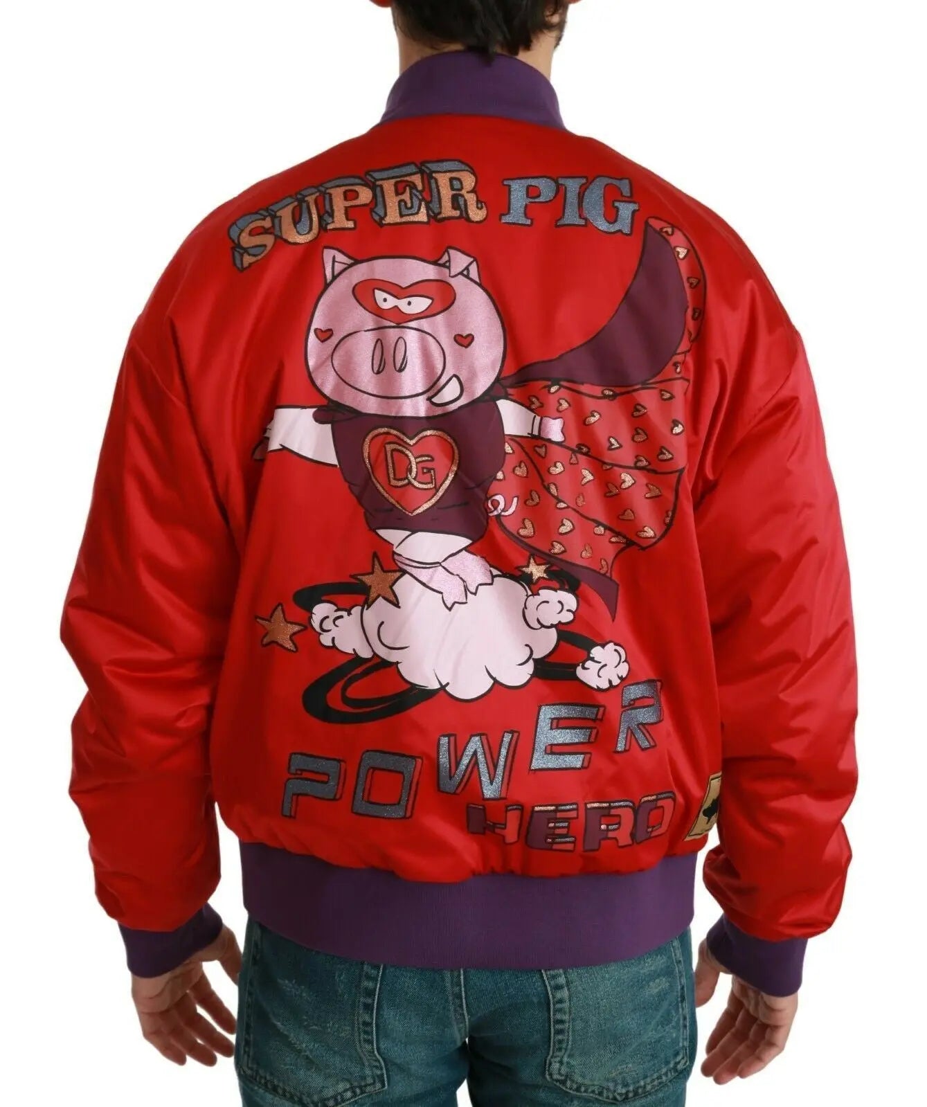 Red bomber jacket with purple ribbed cuffs and hem, featuring a pig emblem patch on the chest and blue snap buttons.