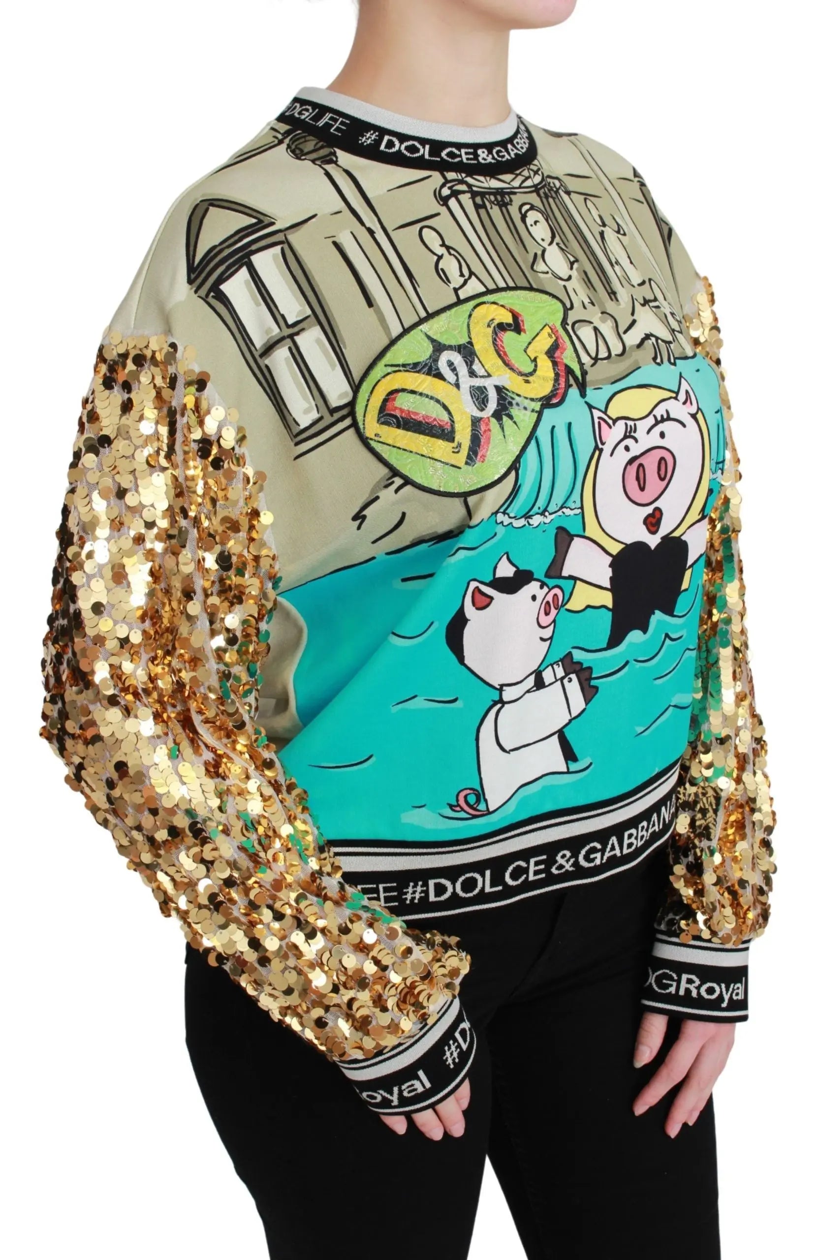 Multicolor sequined sweater with cartoon pig design, gold sequin sleeves, and black logo cuffs.