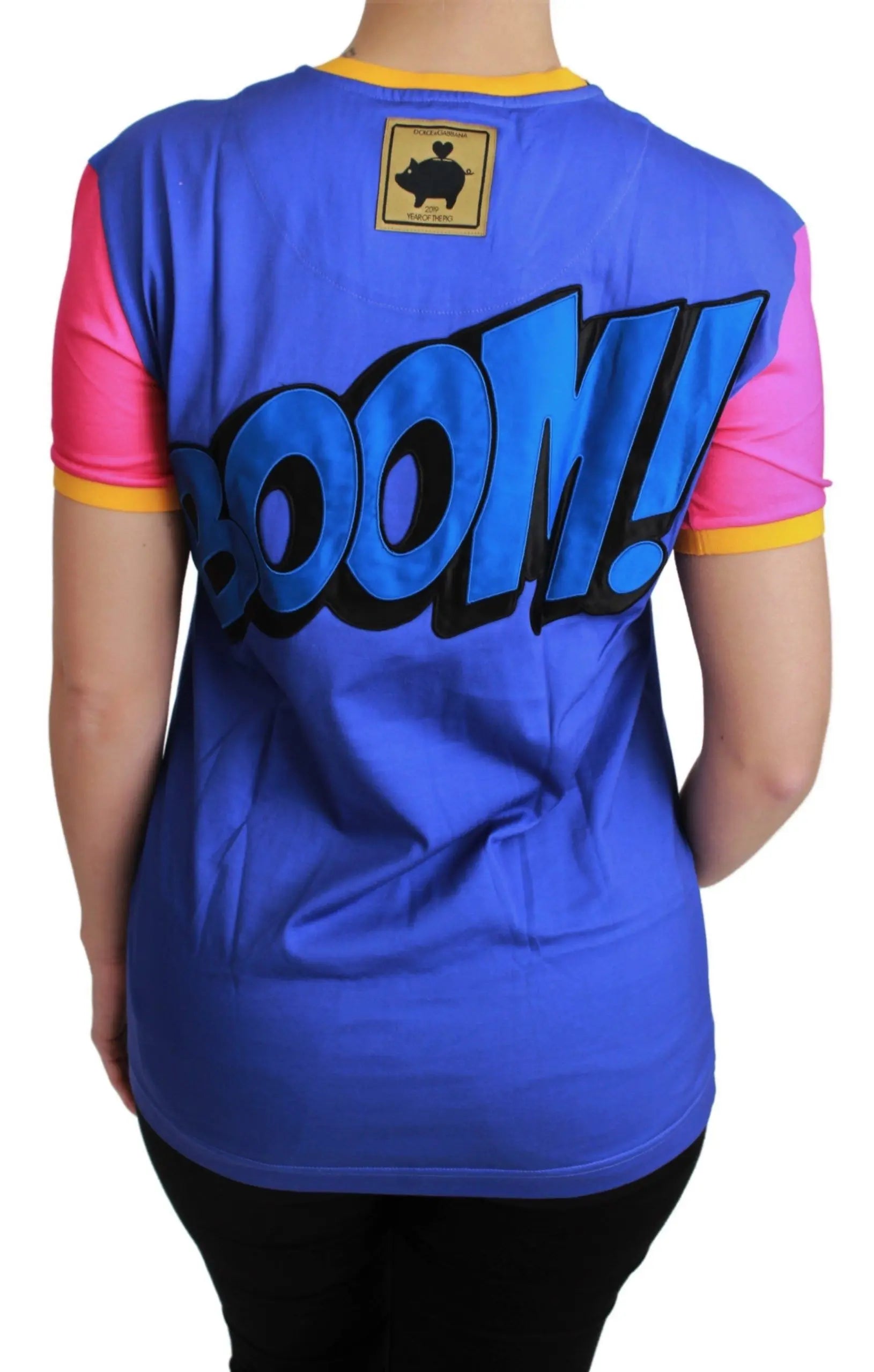 Blue cotton T-shirt with colorful cartoon pig graphic and yellow trim on collar and sleeves.
