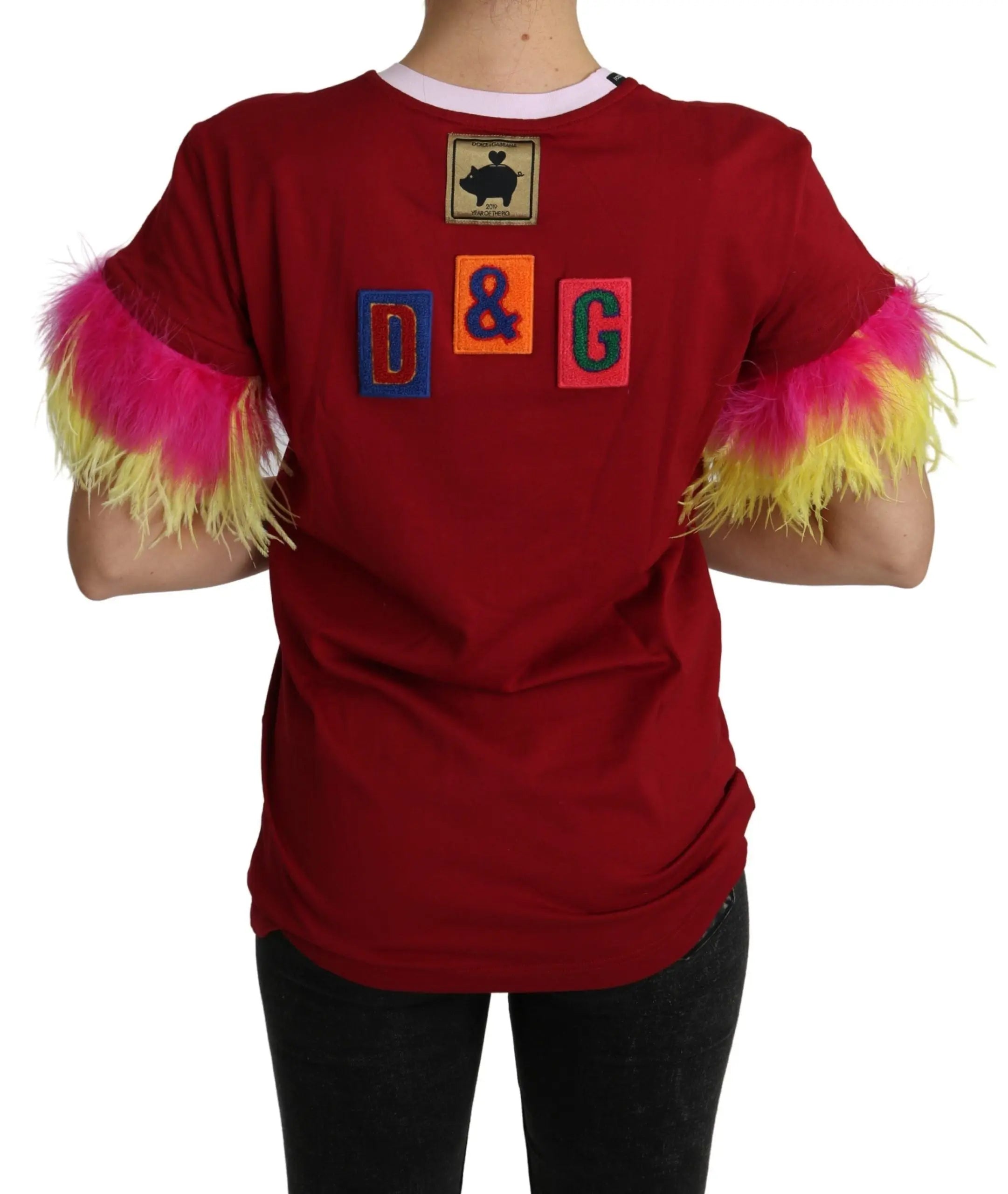 Red cotton T-shirt with cartoon pig print and colorful feathered short sleeves.