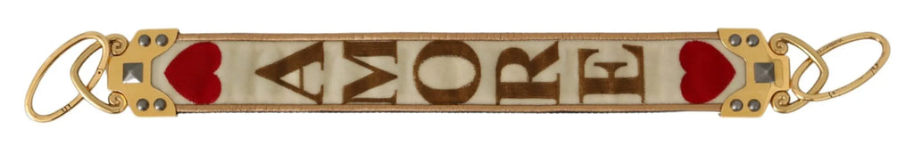 Gold and white textile shoulder strap with red heart and "AMORE" lettering, leather trim, and gold-toned hardware.