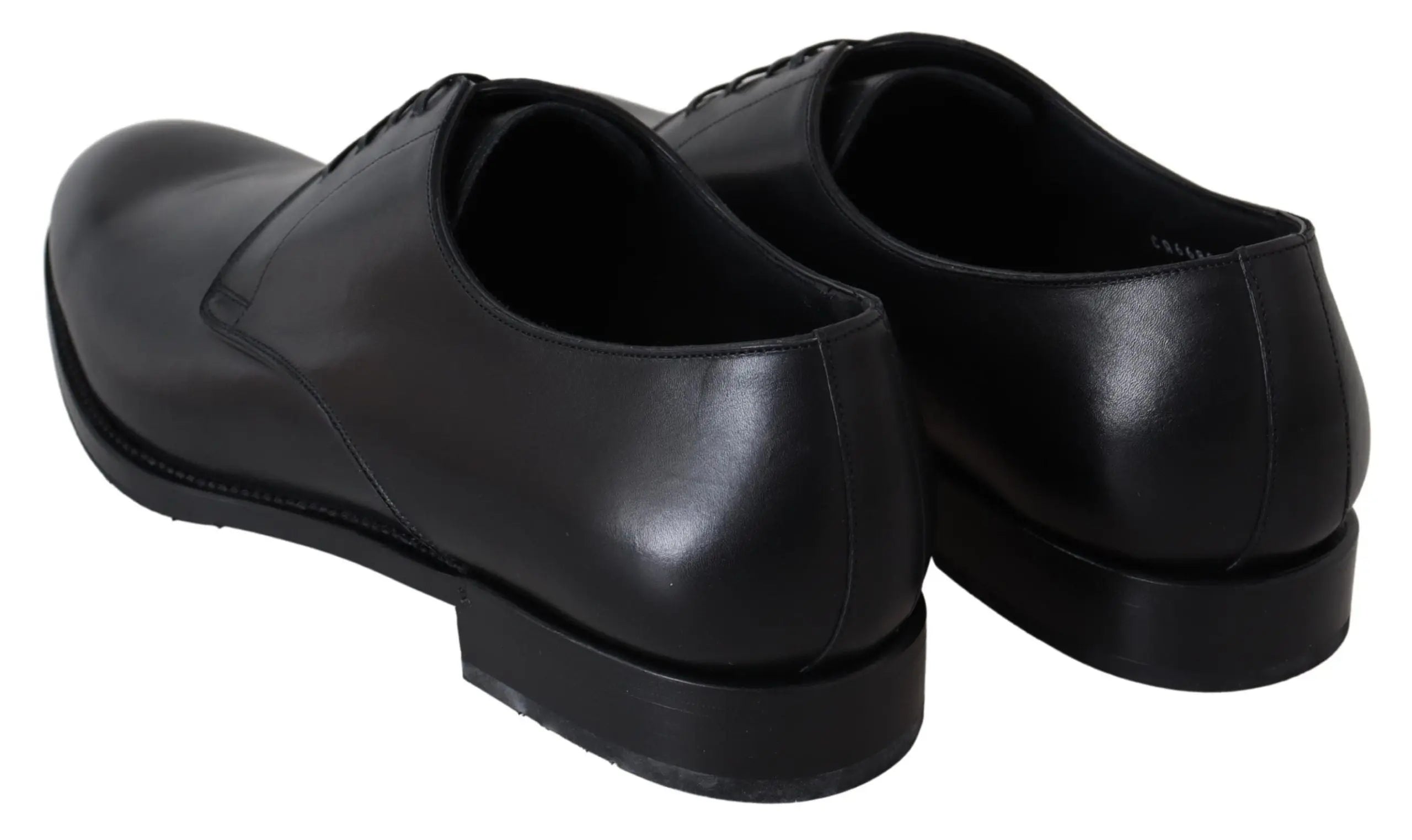 Black leather men's oxford shoe with sleek rounded toe and thin black sole.