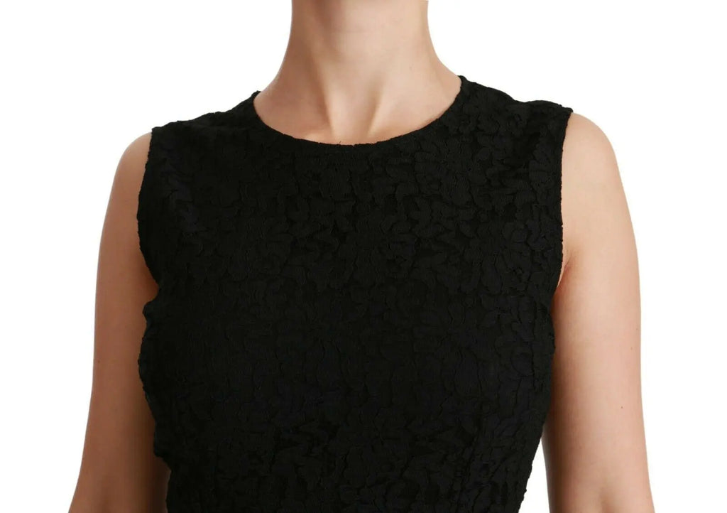 Black sleeveless sheath gown dress with floral lace texture and midi length.