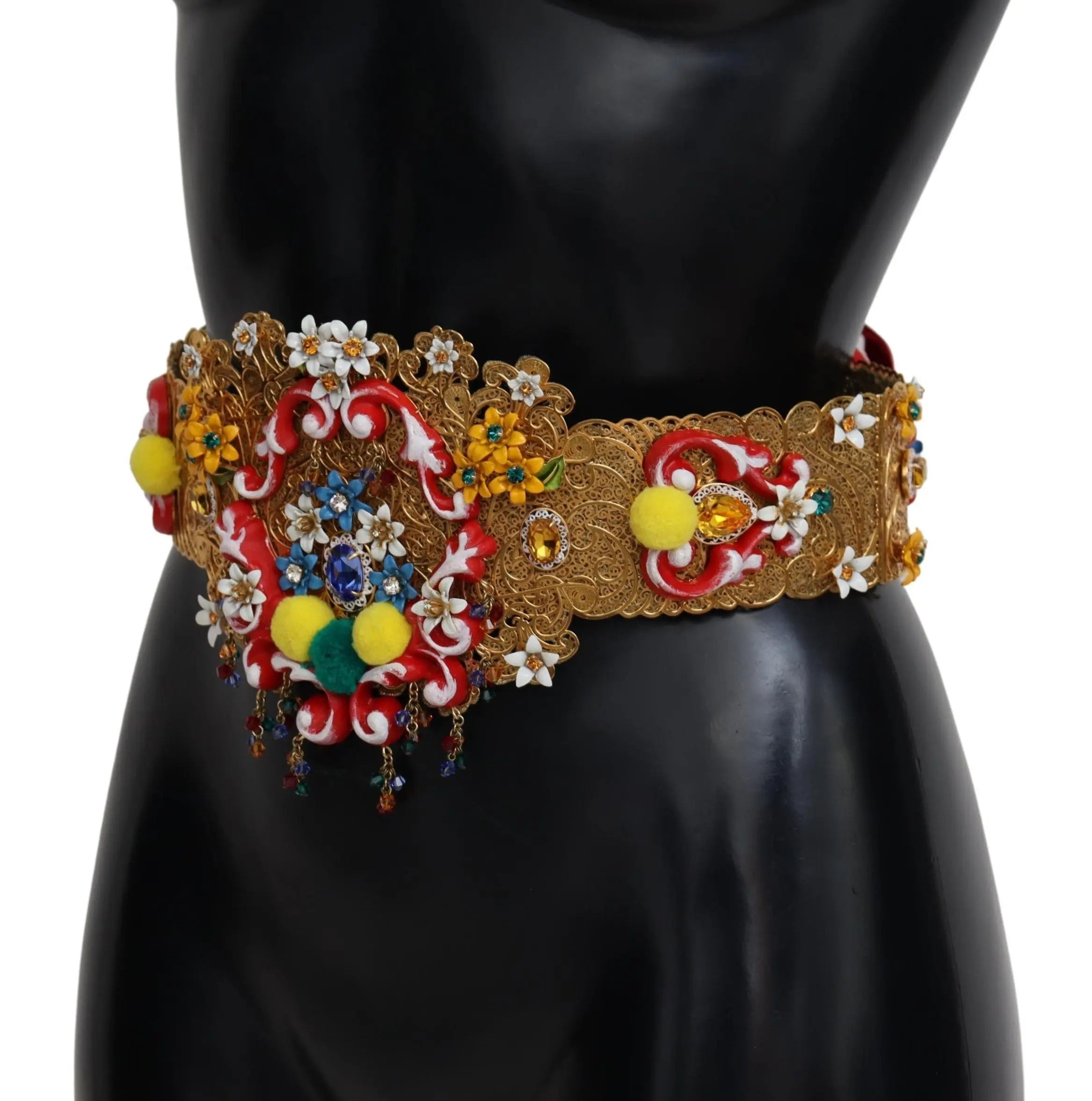 Gold wide waist belt with floral crystal embellishments, colorful pom-poms, and intricate braided detailing.
