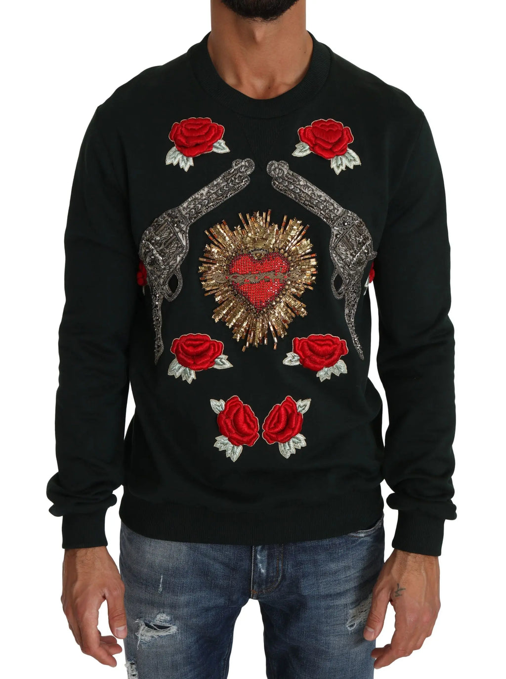 Green crewneck sweater with embroidered crystal heart, roses, and gun motifs.