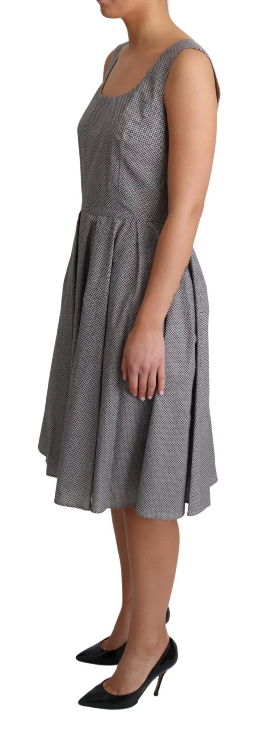 Sleeveless blue-gray cotton A-line midi dress with square neckline and fitted waist.
