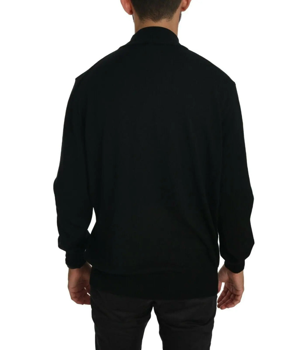 Black virgin wool turtleneck pullover sweater with long sleeves and ribbed cuffs.