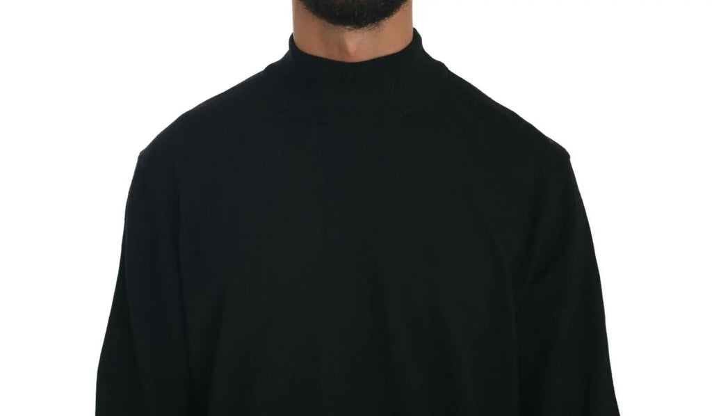 Black virgin wool turtleneck pullover sweater with long sleeves and ribbed cuffs.