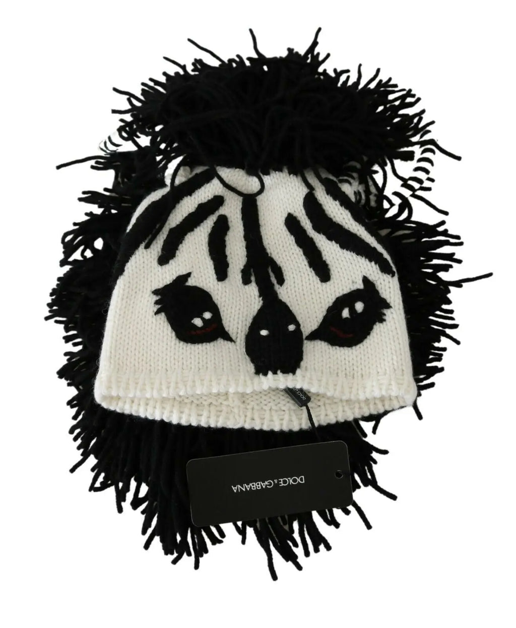 Black and white knitted cashmere beanie with animal face design and black fringe detailing.