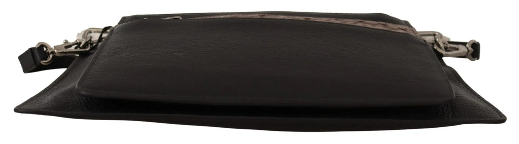 Black leather shoulder sling bag with textured brown exotic leather panel and silver-tone zipper details.