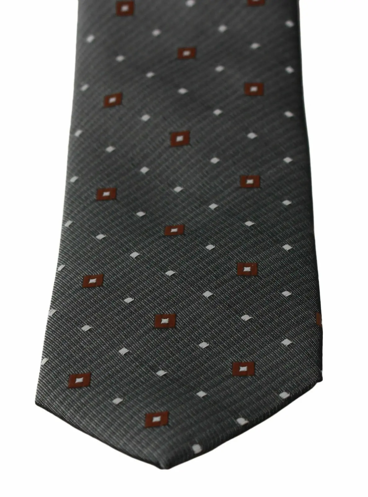Gray slim necktie with subtle diagonal stripes and small red diamond and white dot pattern.