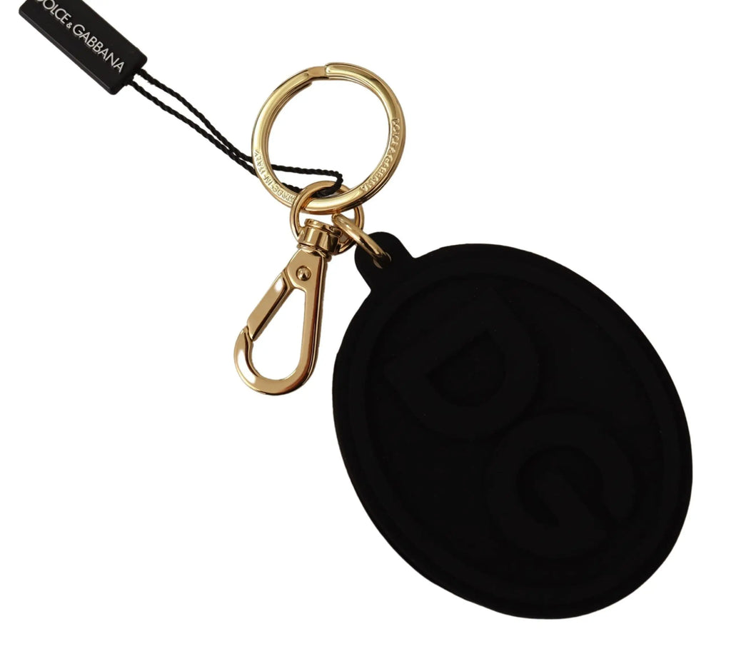 Black rubber oval keyring with embossed DG logo and gold brass metal clip and ring, Dolce & Gabbana tag attached.