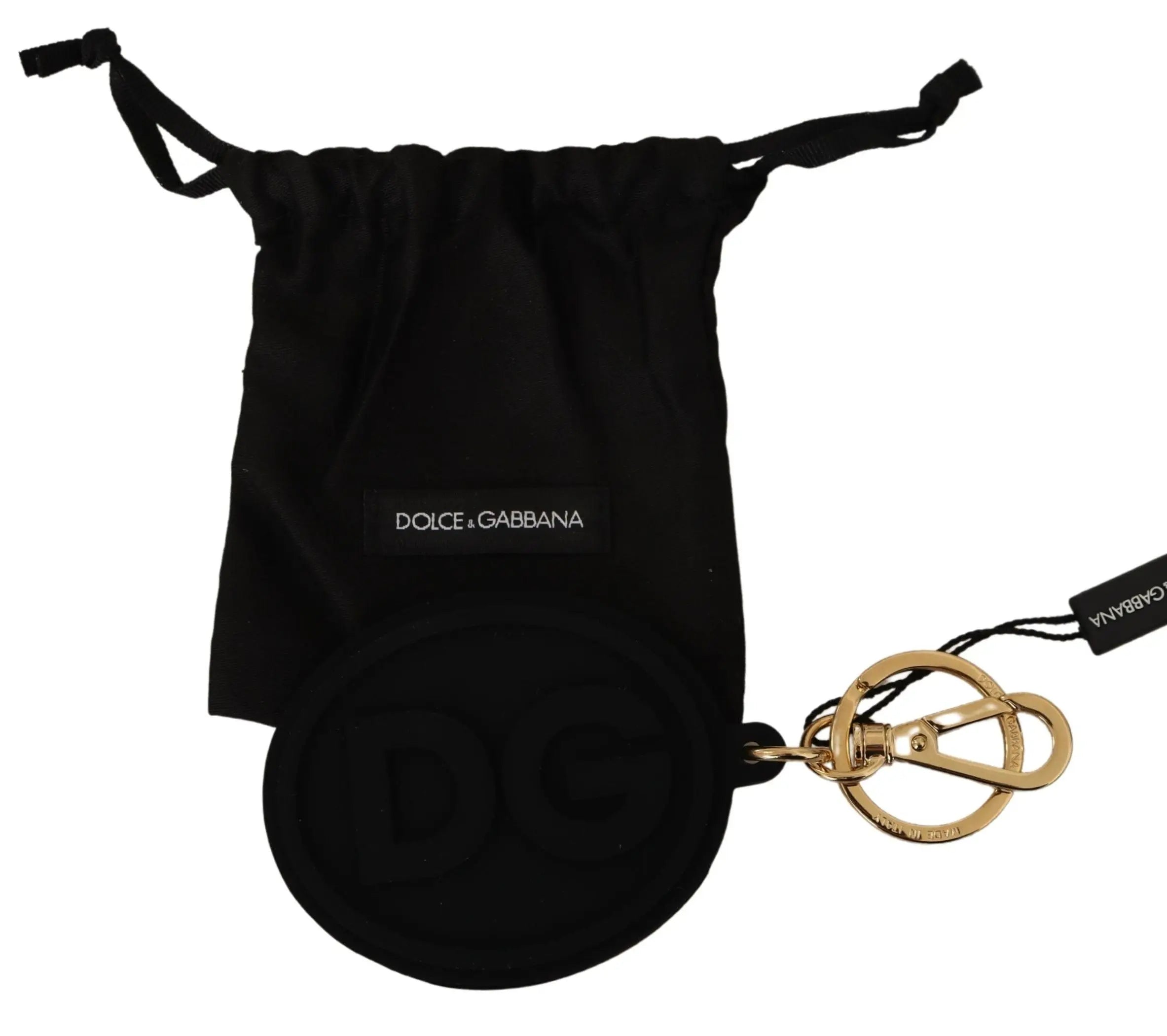 Black rubber oval keyring with embossed DG logo and gold brass metal clip and ring, Dolce & Gabbana tag attached.