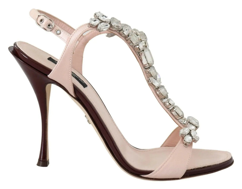 Pink stiletto heel sandal with large crystal embellishments and an ankle strap.