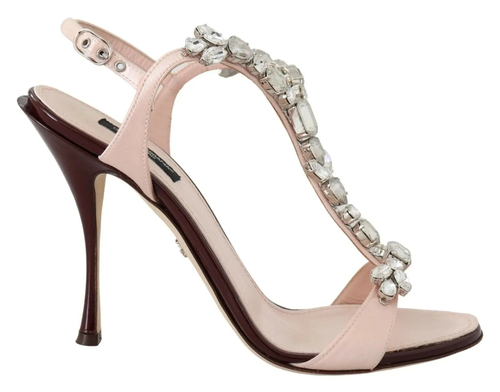 Pink stiletto heel sandal with large crystal embellishments and an ankle strap.