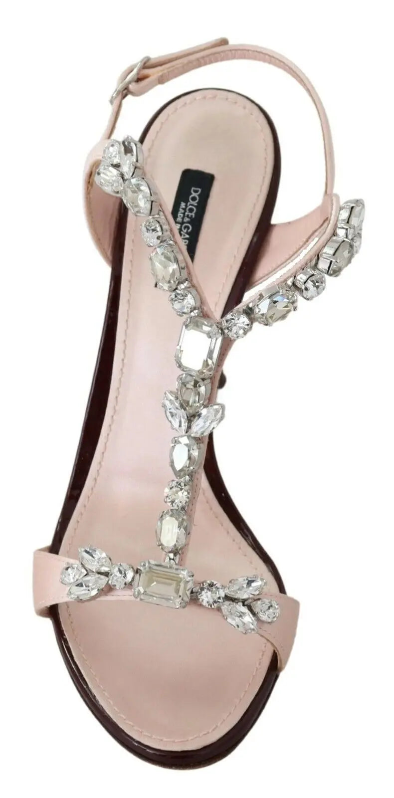 Pink stiletto heel sandal with large crystal embellishments and an ankle strap.