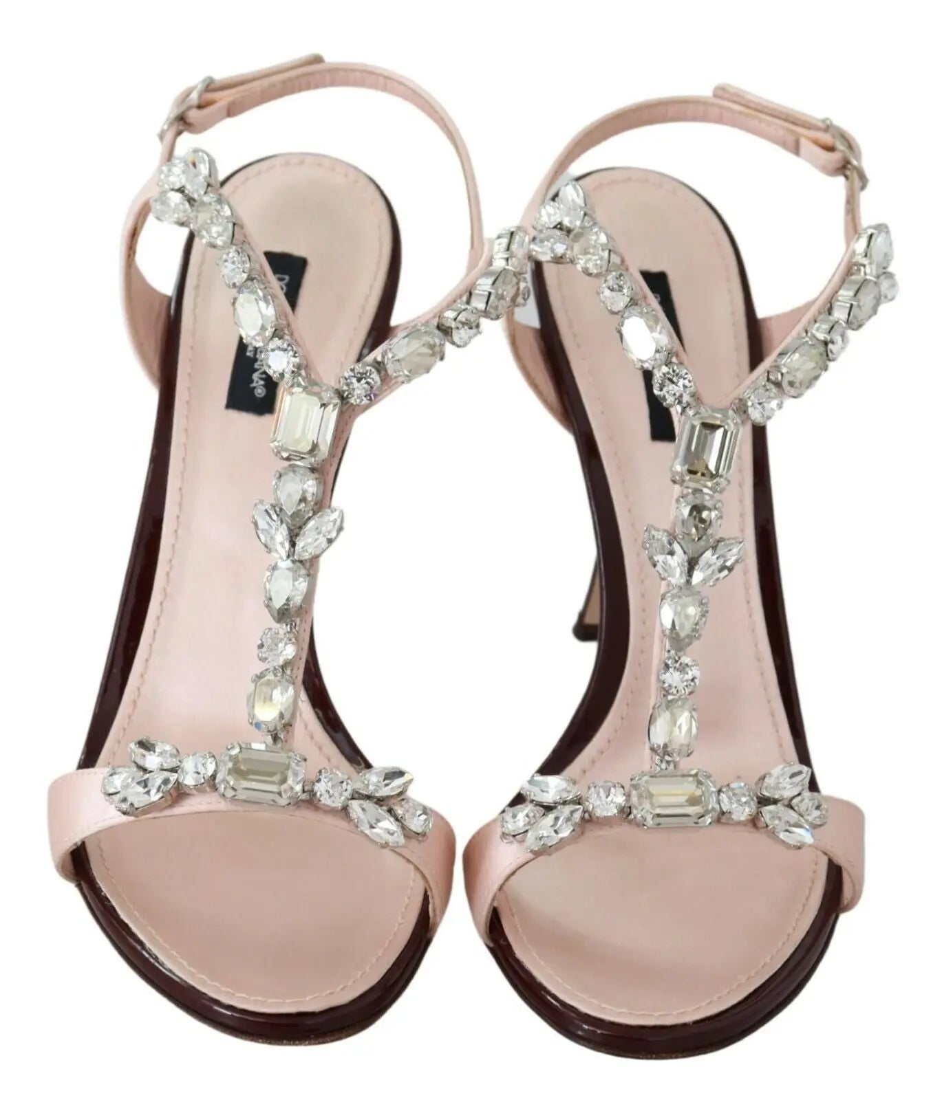 Pink stiletto heel sandal with large crystal embellishments and an ankle strap.