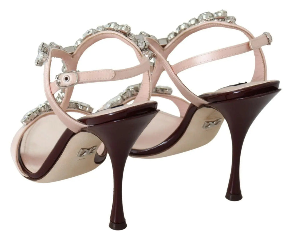 Pink stiletto heel sandal with large crystal embellishments and an ankle strap.