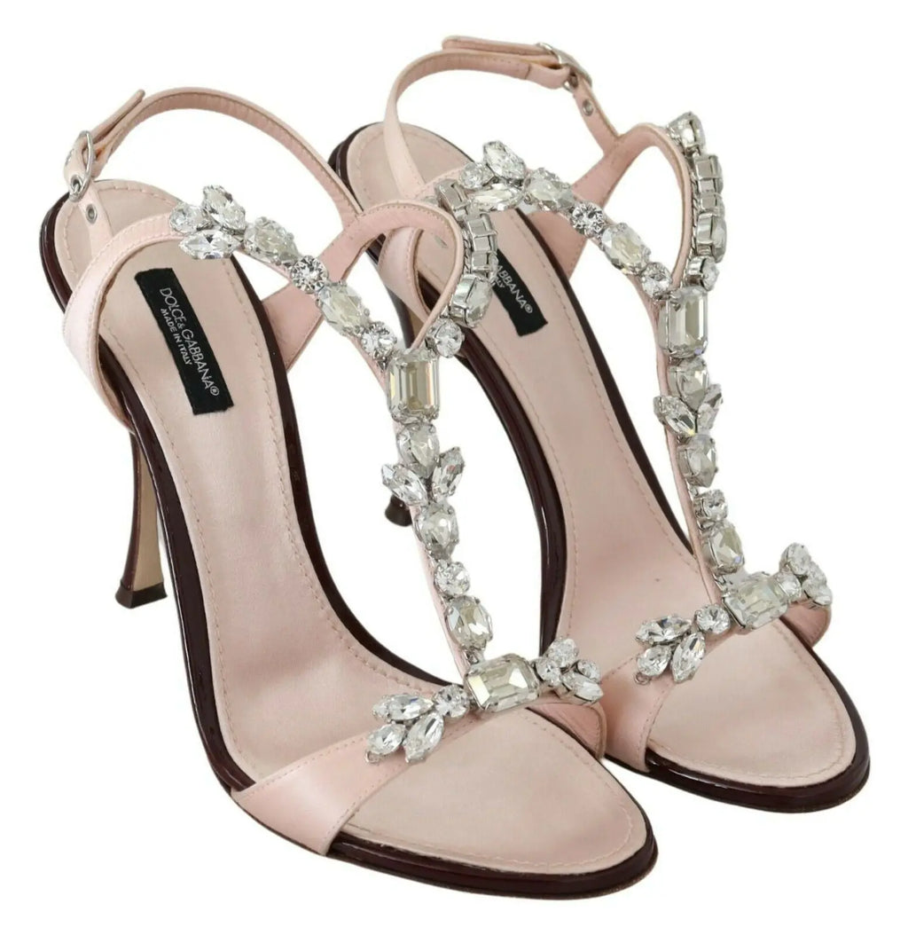 Pink stiletto heel sandal with large crystal embellishments and an ankle strap.