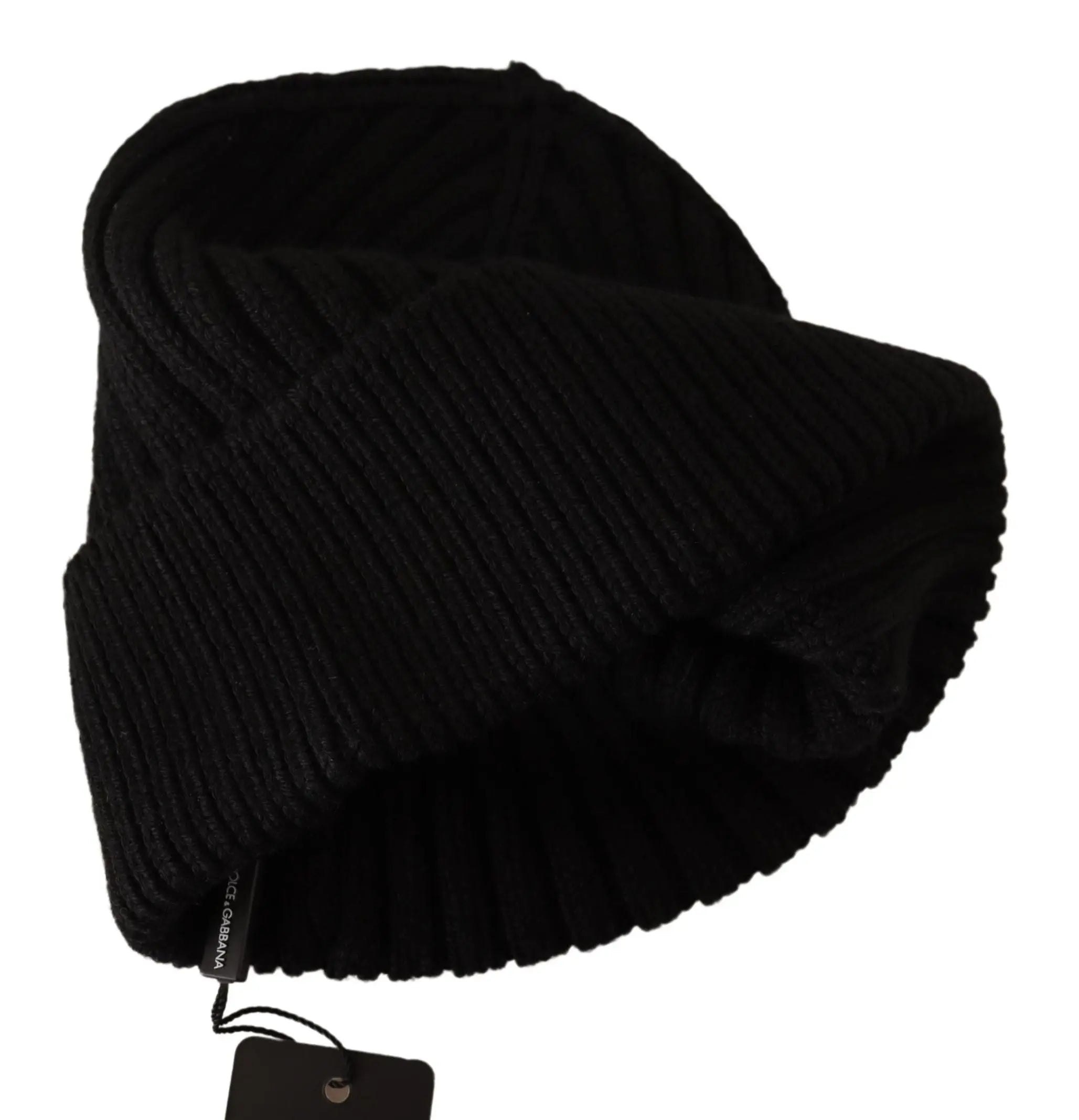 Black ribbed wool knit beanie for women with a folded cuff, shown on a glossy black mannequin head and shoulders.