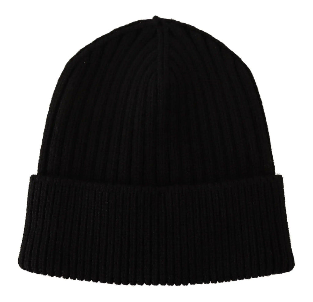 Black ribbed wool knit beanie for women with a folded cuff, shown on a glossy black mannequin head and shoulders.