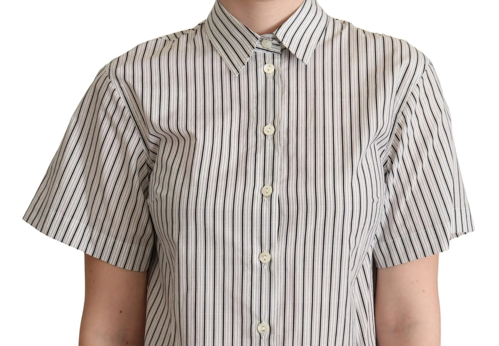 White short-sleeve collared shirt with thin black vertical stripes and button front.