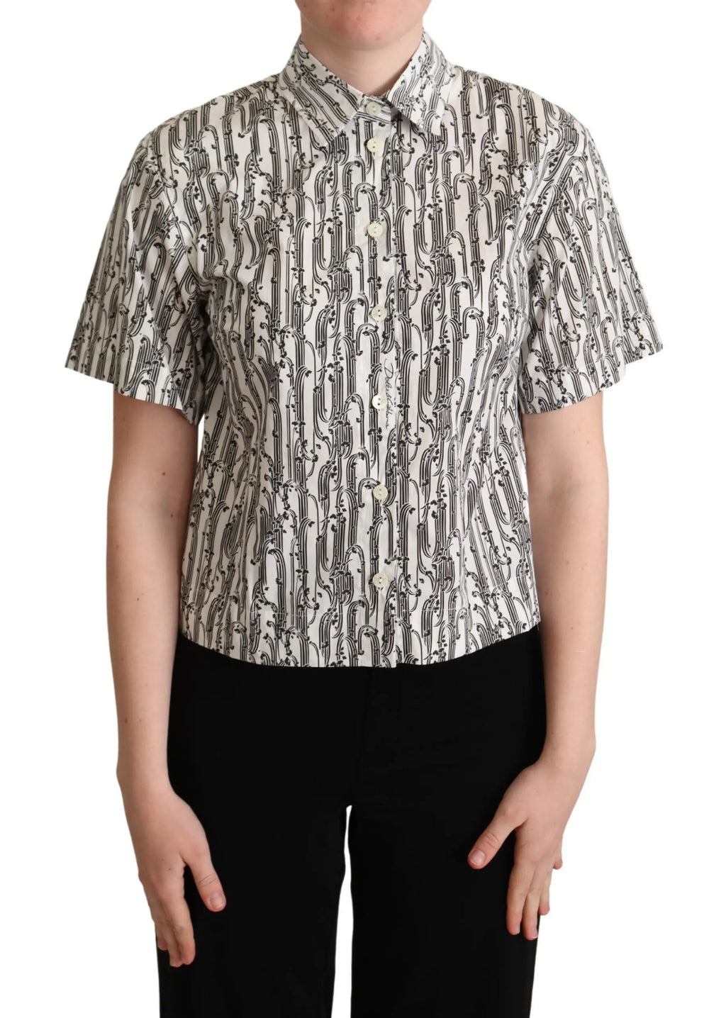 White short-sleeve collared blouse with black abstract floral print, button-down front, fitted cut.