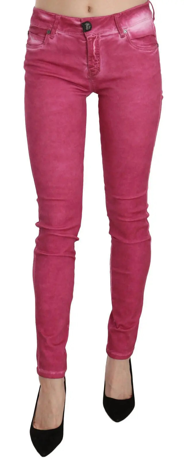 Pink velvet mid-rise skinny trousers with front pockets and button closure.