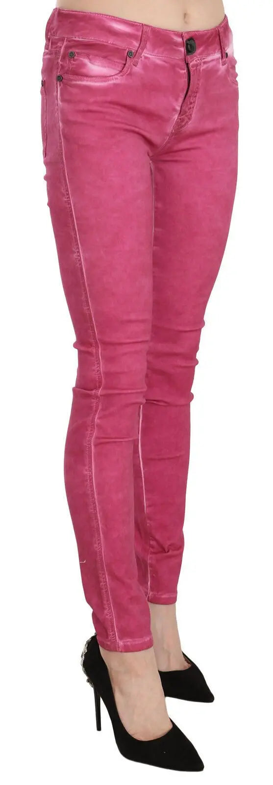 Pink velvet mid-rise skinny trousers with front pockets and button closure.