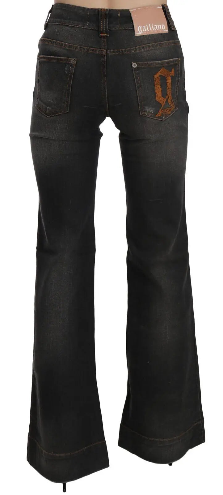 Black washed mid waist flared denim jeans with front pockets and subtle fading.