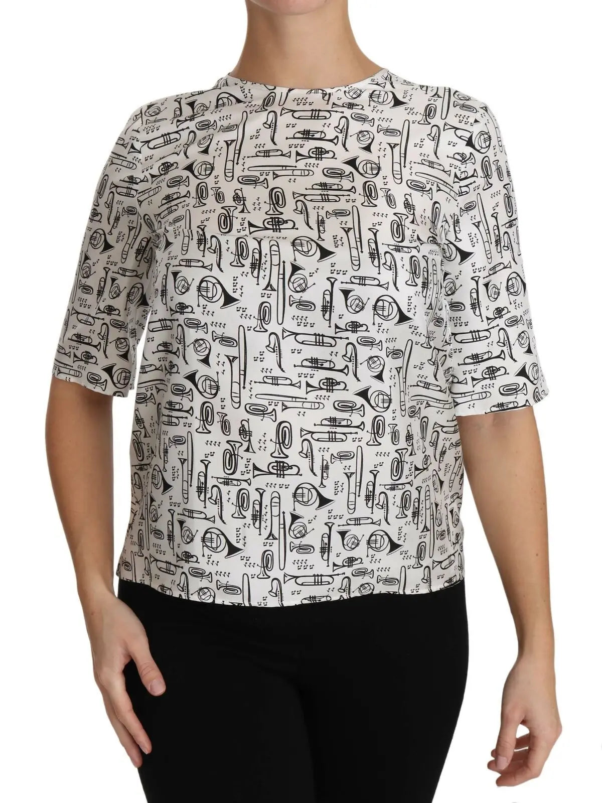 White silk blouse with black musical instrument sketches, short sleeves, crew neck, relaxed fit.