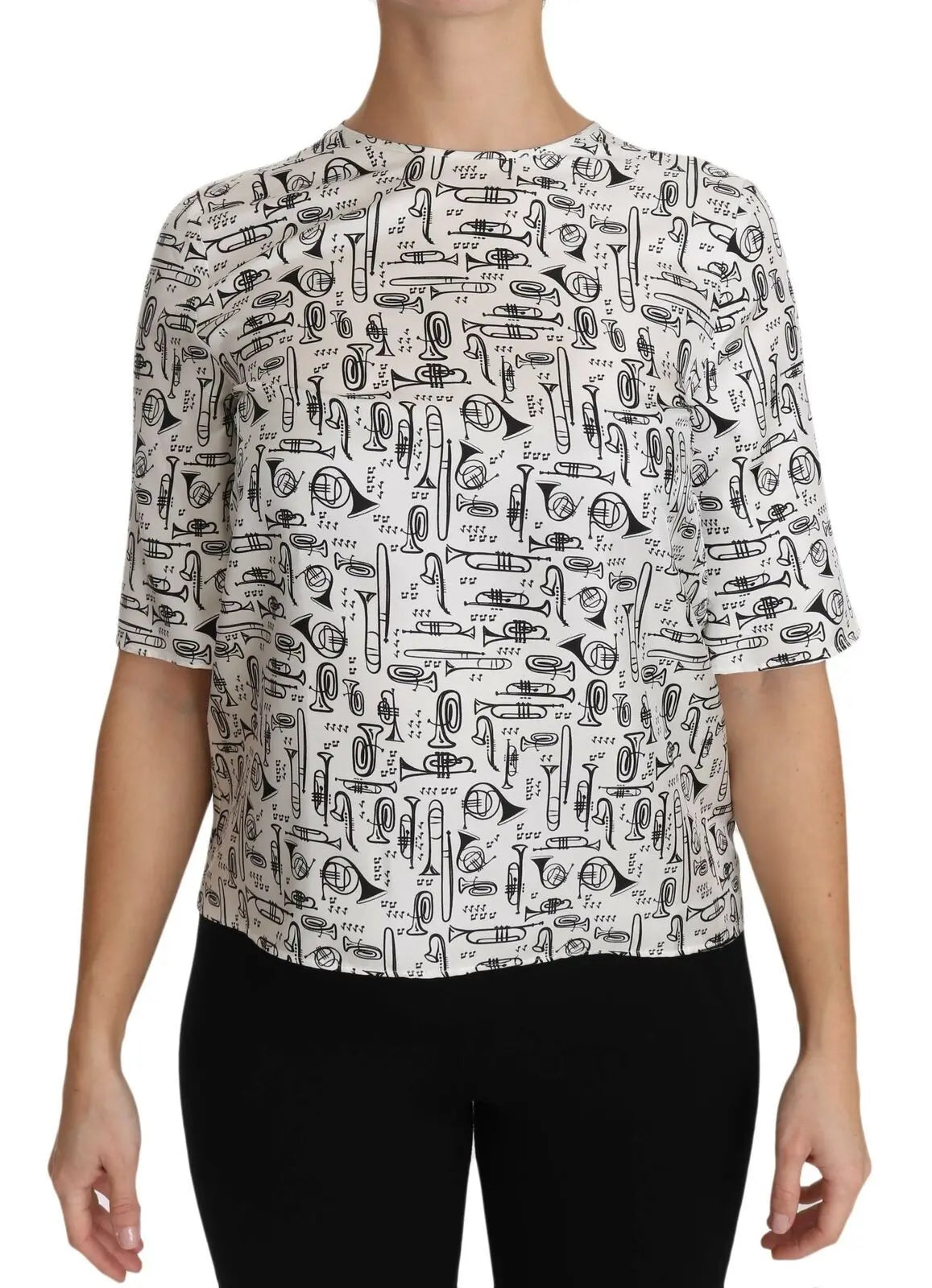 White silk blouse with black musical instrument sketches, short sleeves, crew neck, relaxed fit.