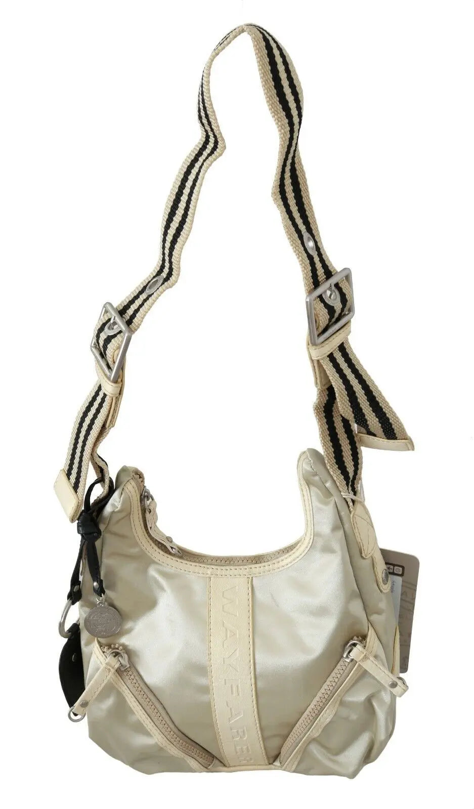 White fabric crossbody sling bag with beige trim and adjustable striped shoulder strap.