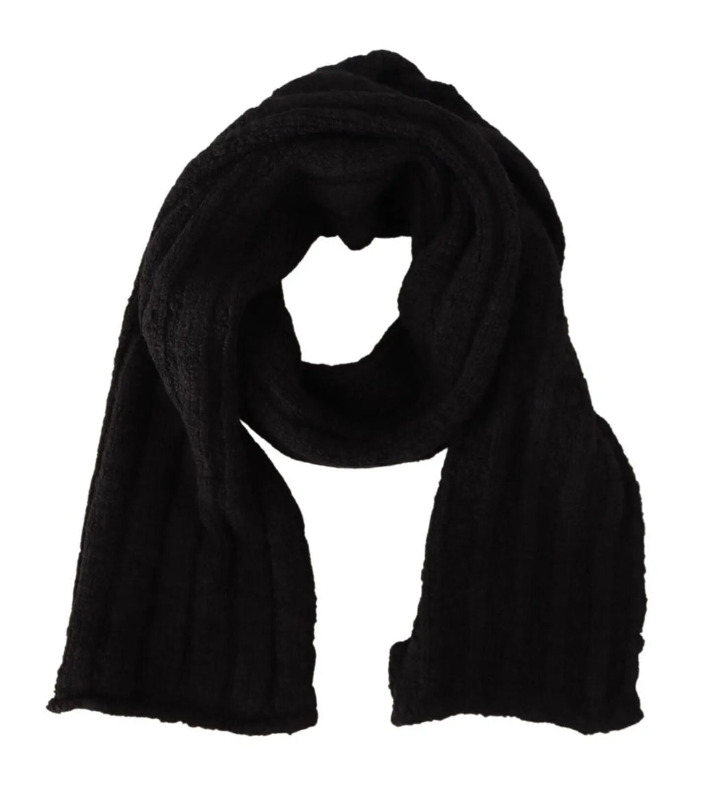Black knitted virgin wool shawl scarf with ribbed texture and soft, warm finish.