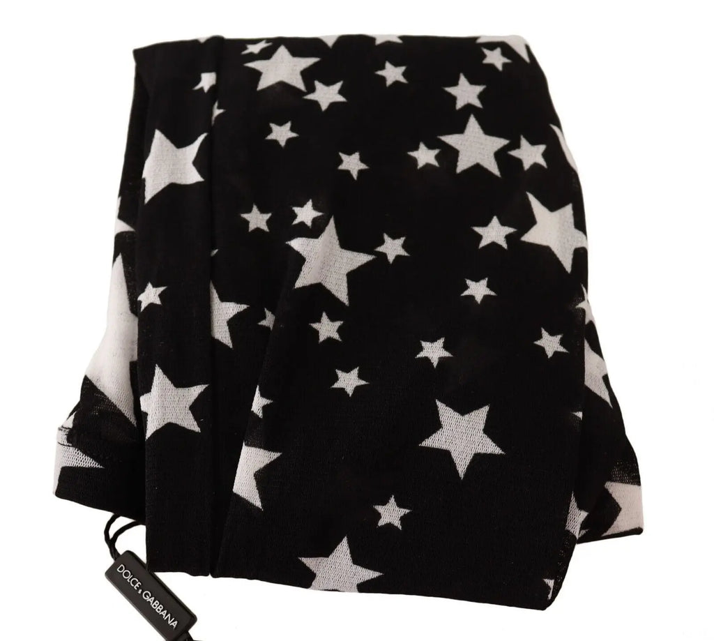 Black nylon stockings with large and small white star patterns in varying sizes.