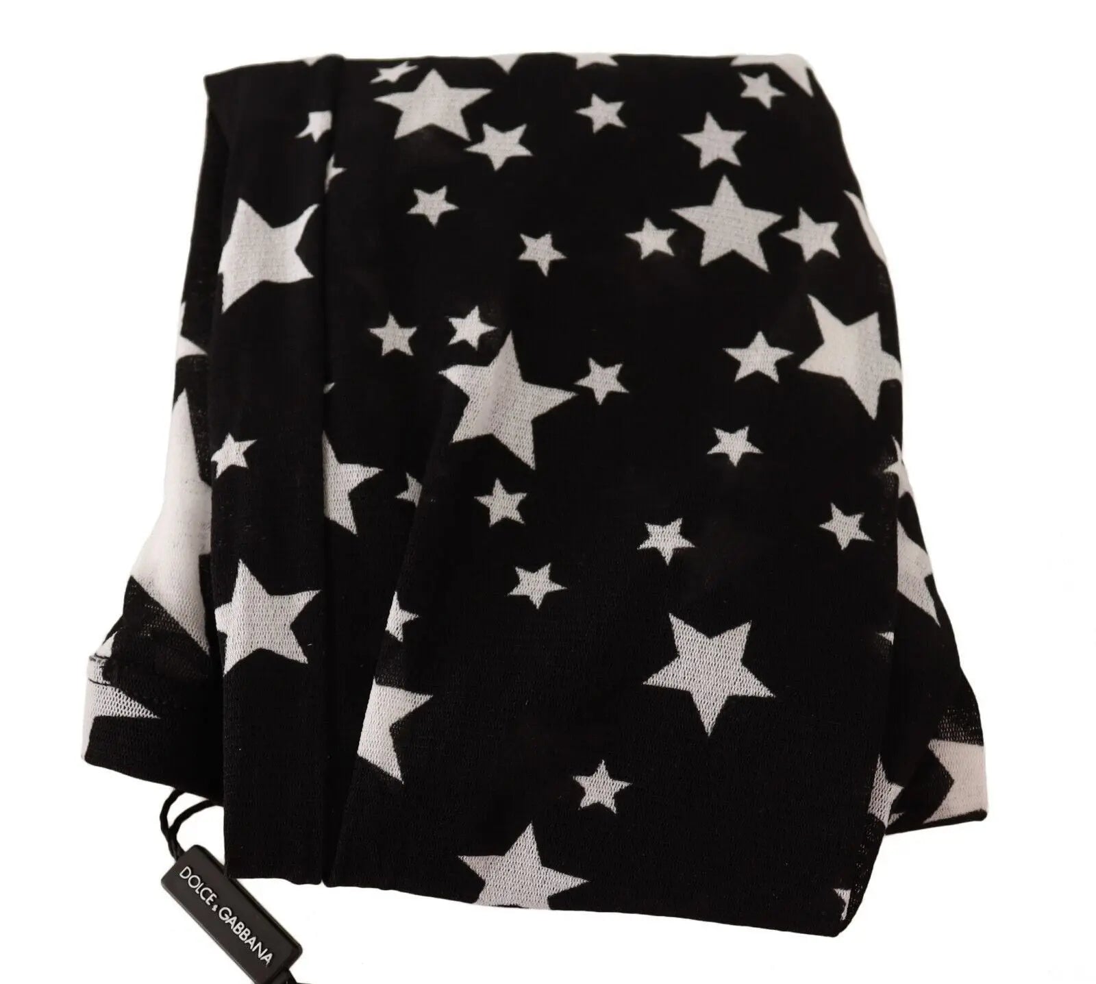 Black nylon stockings with large and small white star patterns in varying sizes.