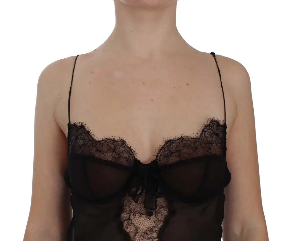 Black silk babydoll lingerie top with lace trim and scalloped hem, sheer fabric, and thin spaghetti straps.