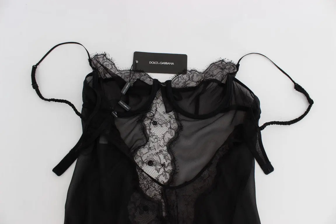 Black silk babydoll lingerie top with lace trim and scalloped hem, sheer fabric, and thin spaghetti straps.