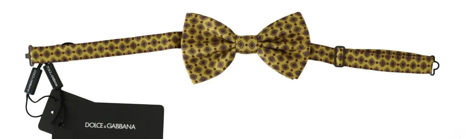 Yellow silk bow tie with purple and black geometric pattern, adjustable strap.