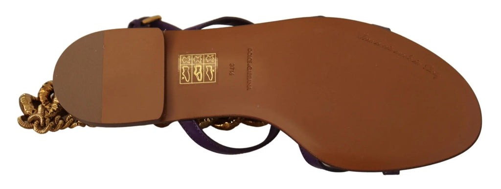 Purple leather flat sandal with gold chain and decorative beading on ankle strap.