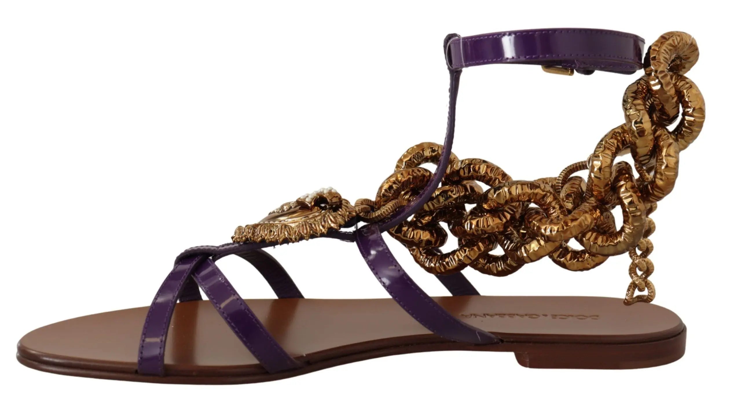 Purple leather flat sandal with gold chain and decorative beading on ankle strap.