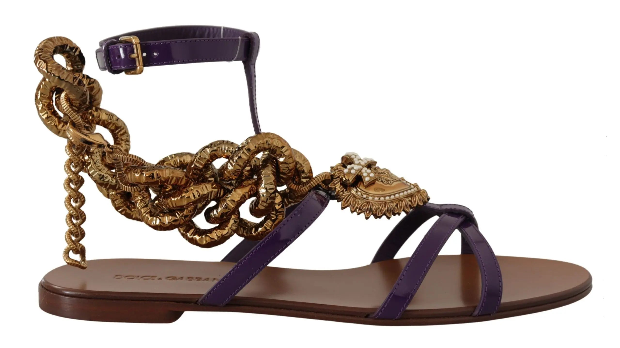 Purple leather flat sandal with gold chain and decorative beading on ankle strap.