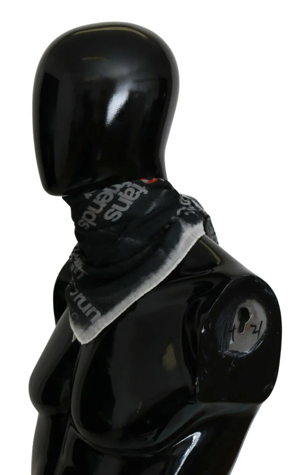 Dark gray wool foulard scarf with white and red text pattern and grid design.