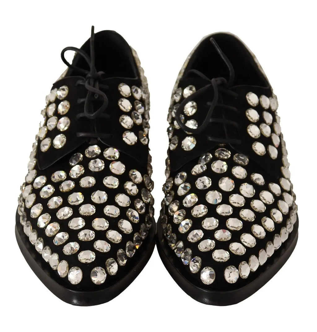 Black leather lace-up Oxford shoe adorned with large round crystals and a low heel.